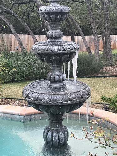 Frozen damaged fountain