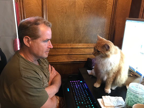 Gordon and Tuna staring at each other.