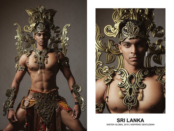 Man in Sri Lankan national costume: red and gold kilt, naked from the waist up, wearing a frame of stylized golden flames on his shoulders and head.