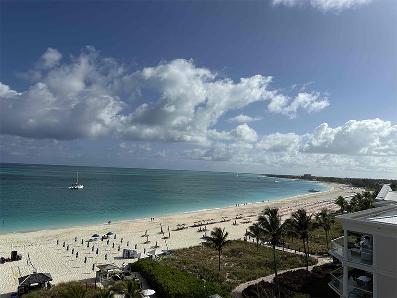Beautiful wide shot of the turquoise sea with blue sky above.