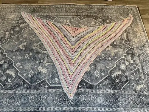 Beautiful multicolored shawl crocheted.