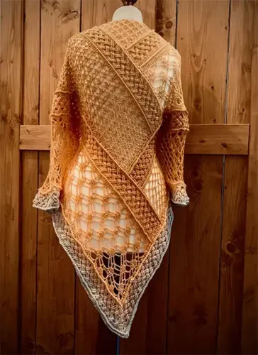 Picture of a complicated crochet shawl with interesting basket weave.