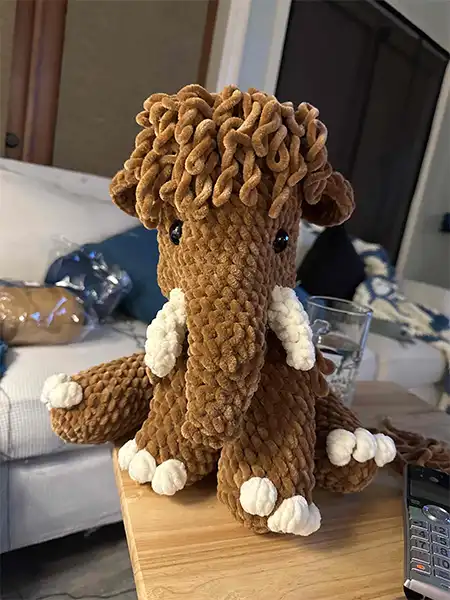 Stuffed crochet mammoth made of chenille yarn, kind of cute. 