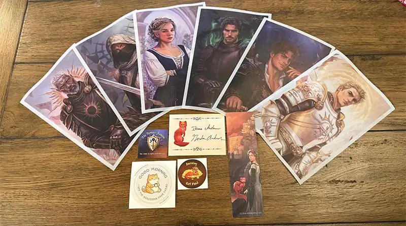 The contents of the media envelope including prints and stickers.