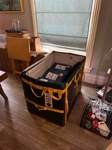 Picture of a giant Amazon container that has vellum order sin it.
