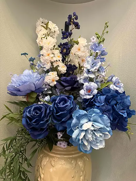 Close up of the blue faux flowers.